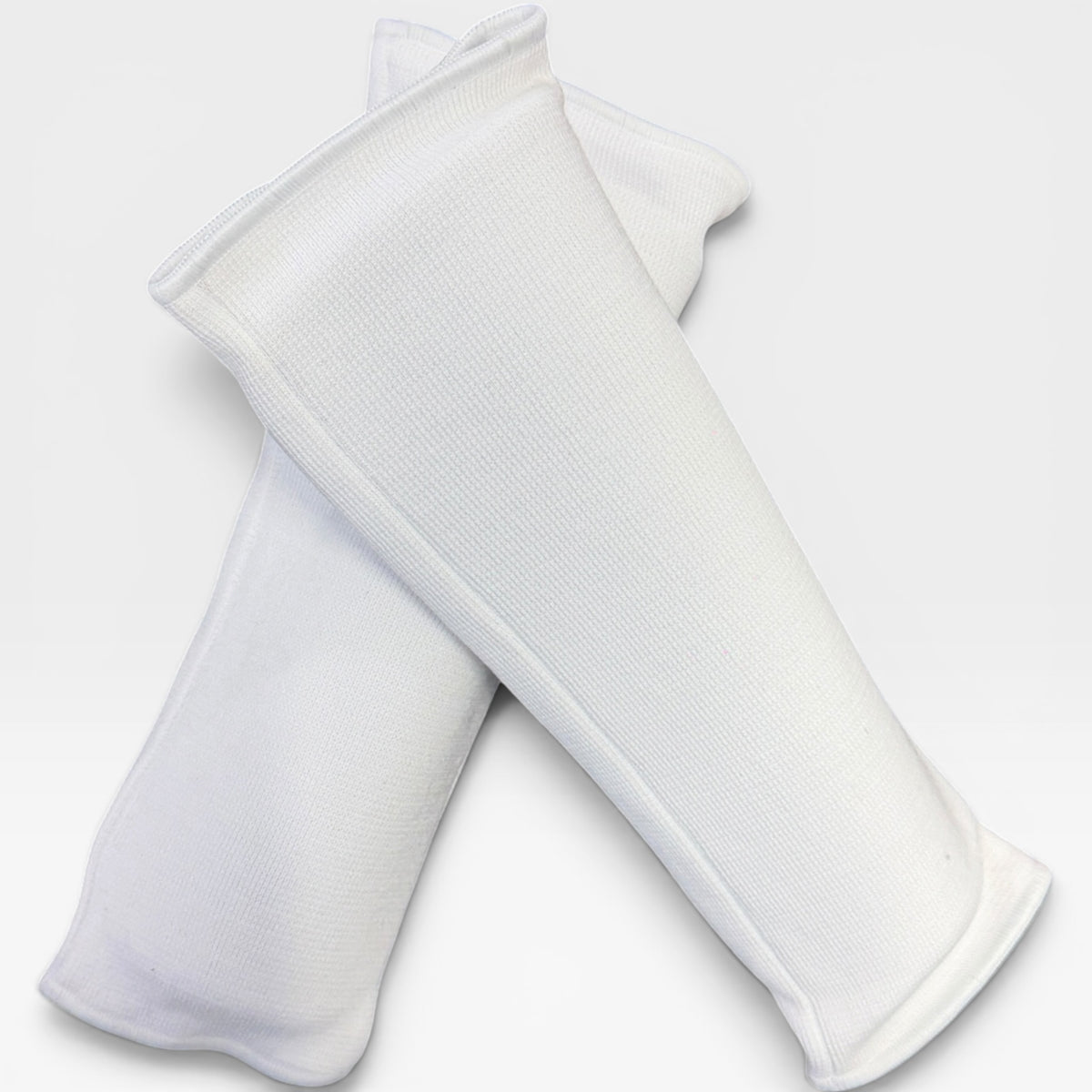 White padded forearm guards