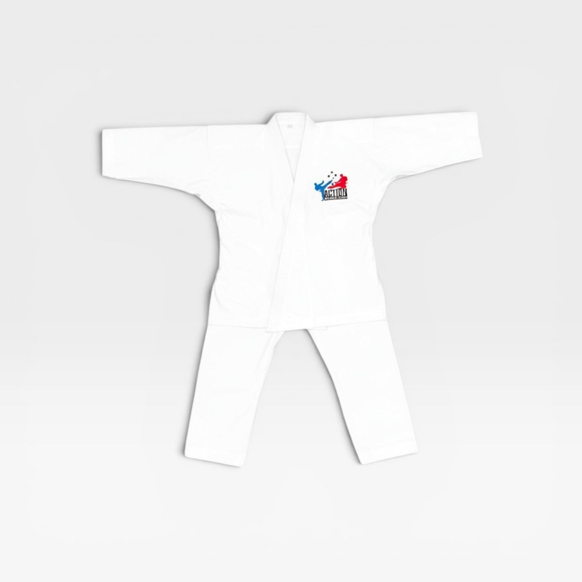 White heavyweight canvas taekwondo uniform with Action Tae Kwon-Do patch